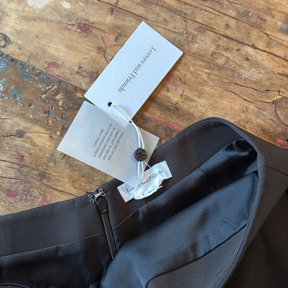 Black Mini Skirt with Floral Accent - Picture 3 of 5